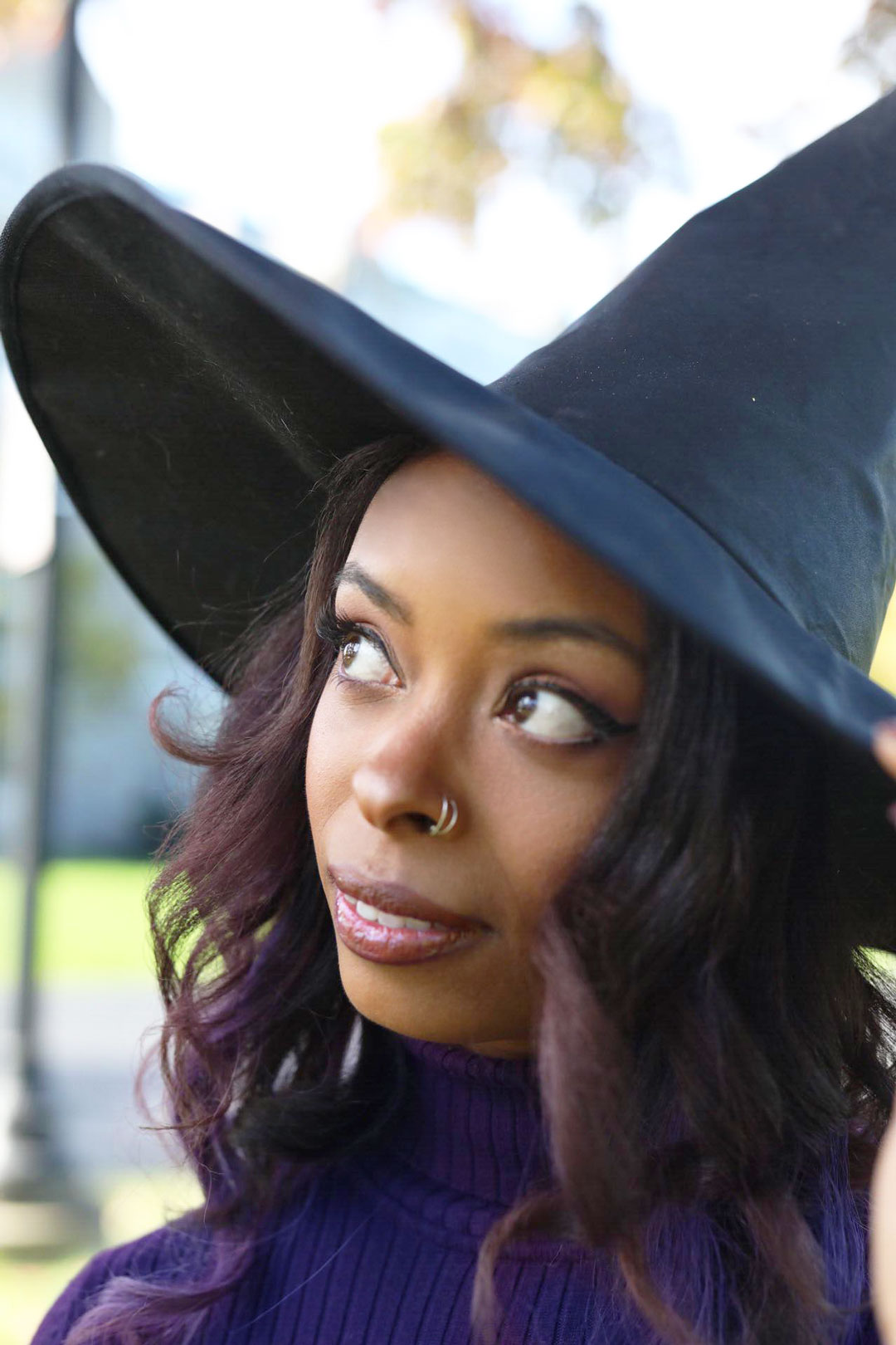 Afura wearing a witch hat