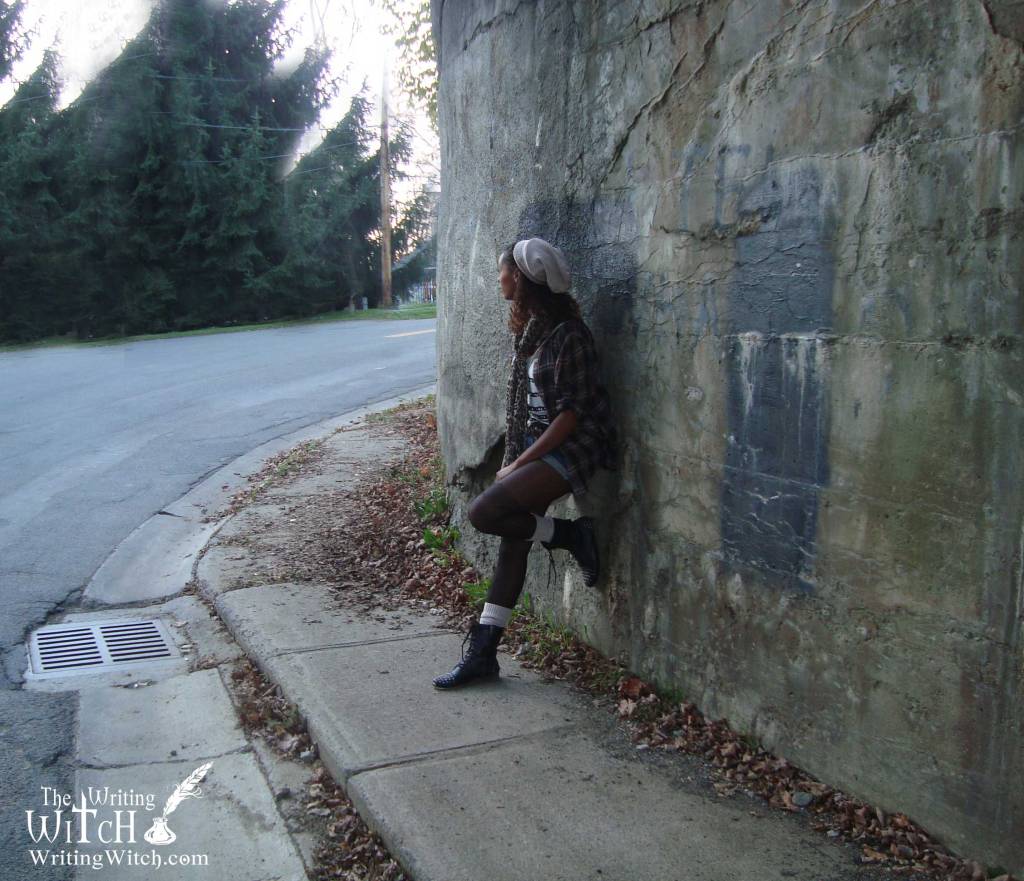 woman under a bridge in autumn