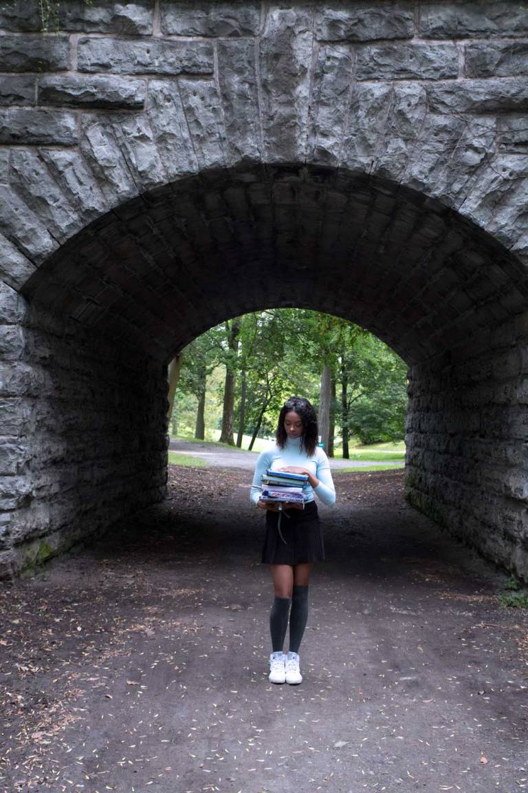 afura with books under stone bridge 2017